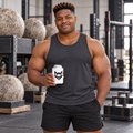 AI-generated original adult strongman model in a strongman gym holding W8WOLF Essentials Wolf Can Cooler with original black wolf and red eyes. Original supplier sleeve photo retained. Can and training clothing are styling only.