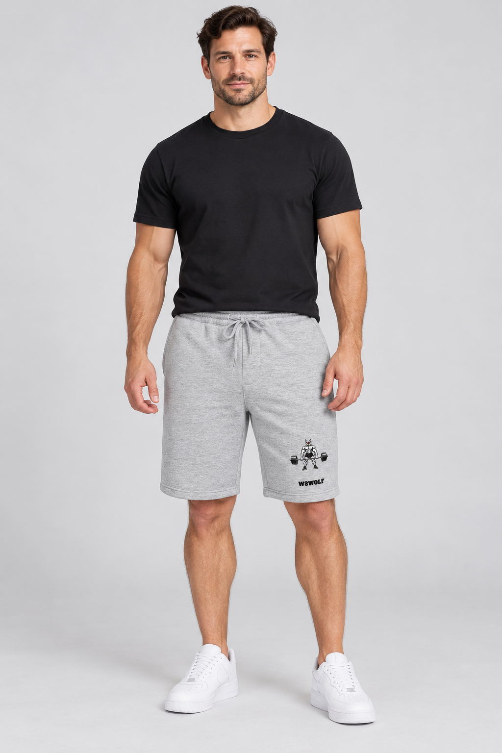 AI-generated original adult model visualization wearing Heather Grey W8WOLF Iron Deadlift Fleece Shorts with left-leg red-eyed wolf and separate black wordmark. Original supplier front and back photos retained.