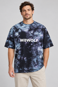 AI-generated original adult model wearing W8WOLF Milky Way Wordmark oversized tie-dye tee; illustrative fit image based on actual product. Natural dye patterns vary.