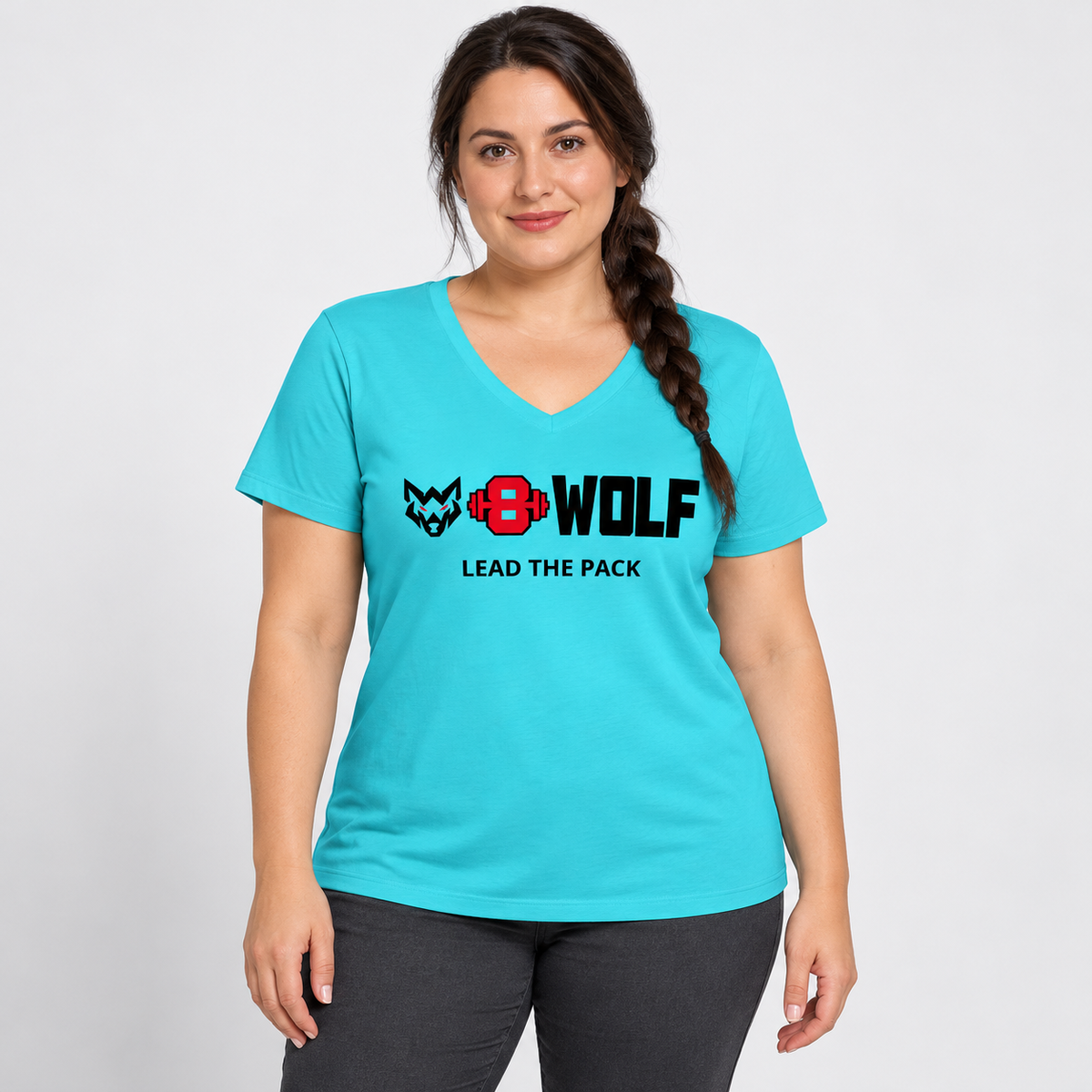 AI-generated original adult model visualization wearing Turquoise W8WOLF Essentials Women’s Lead the Pack V-Neck with original red-eyed wolf, red barbell 8, thick black WOLF and LEAD THE PACK print. Supplier views of all three colors retained. Trousers are styling only.