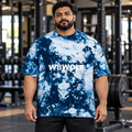 AI-generated original adult male strongman wearing the W8WOLF Navy Unleash oversized tie-dye tee; styling illustration.