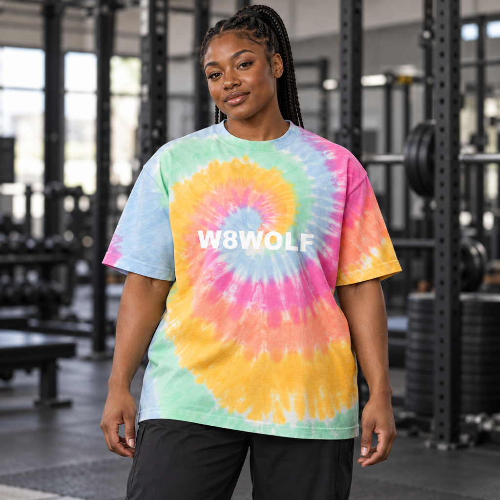 AI-generated original adult woman wearing the W8WOLF Sherbet Lead the Pack oversized tie-dye tee; styling illustration.