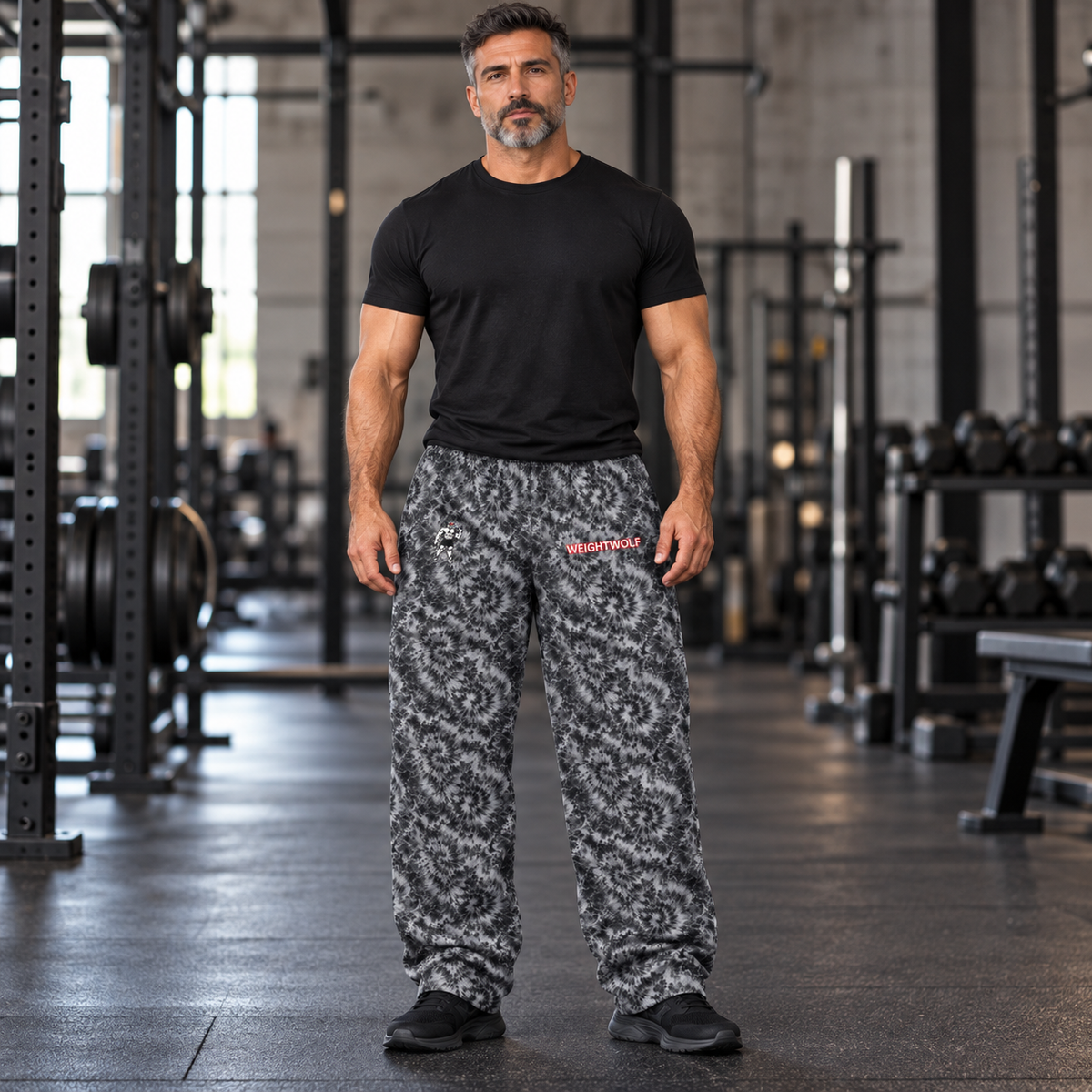 AI-generated original adult male model wearing WEIGHTWOLF Grayscale Overload cotton wide-leg pants with original wolf right thigh and red-outlined wordmark left thigh. Shirt and shoes styling only.